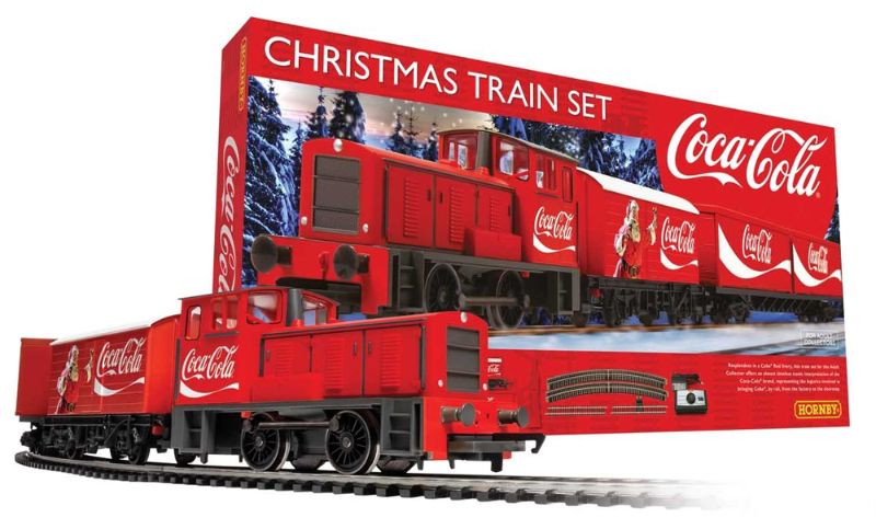 Hornby Coca-Cola Christmas Train Set featuring a festive locomotive and wagons adorned with iconic holiday branding.