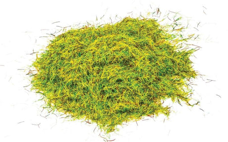 Vibrant 2.5mm static grass by Hornby, ideal for creating realistic summer landscapes in model railway and diorama scenes.