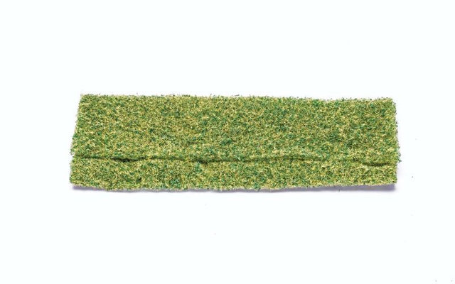 Lush light green wild grass model scenery for realistic train layouts and dioramas, measuring 11cm x 27.6cm x 2.8cm.