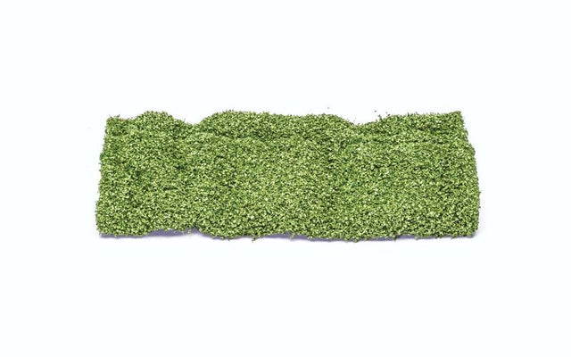 Lifelike middle green foliage for 1/76 model train landscapes, enhancing realism in dioramas and scenic displays.