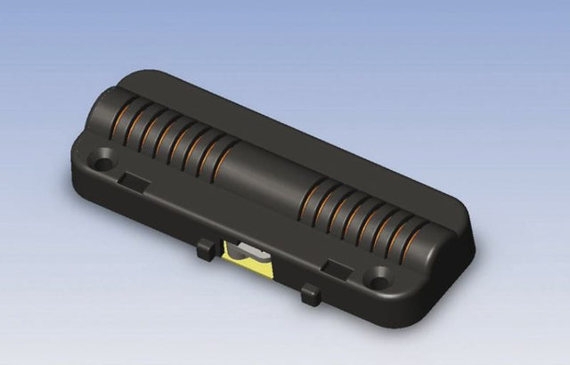 Surface-mounted Hornby point motor for seamless track switching in model railway layouts, compatible with digital and DC control.