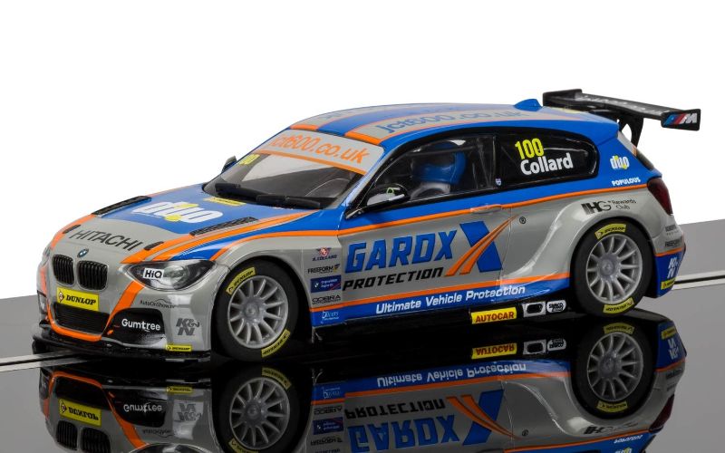 1/32 scale Scalextric BMW 125 #100, a detailed replica of Rob Collard’s car from the BTCC, ideal for slot car racing.