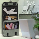 Stylish Knox 25cm Grey Toiletry Bag set of 3 with ample storage, zippered pockets, and convenient carry handle for organized travel.