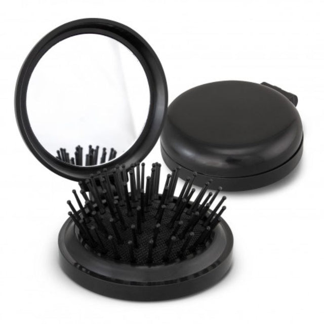 Compact black hairbrush set with mirror, ideal for travel and everyday use, compact design for easy portability.