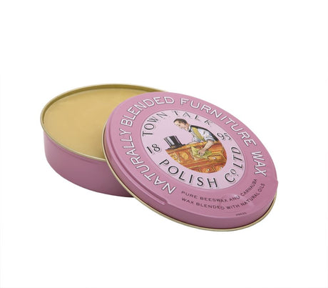 Tin of premium Furniture Wax, naturally blended to restore and protect wood surfaces with a long-lasting sheen.