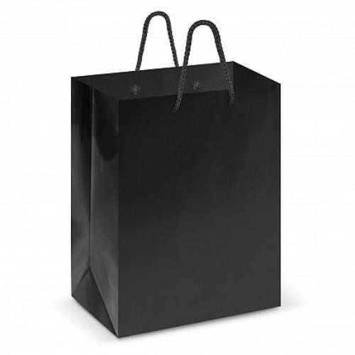 Set of 30 medium black laminated carry bags with sturdy woven handles, ideal for shopping or gifts.