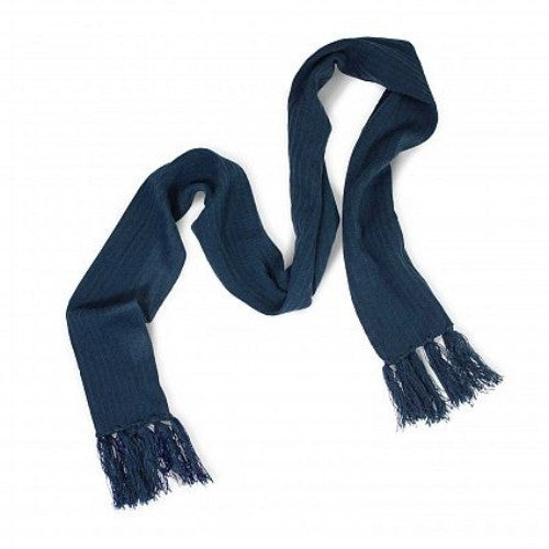 Navy cable knit scarf with tassels, made from soft acrylic, perfect for stylish warmth and versatility in winter outfits.