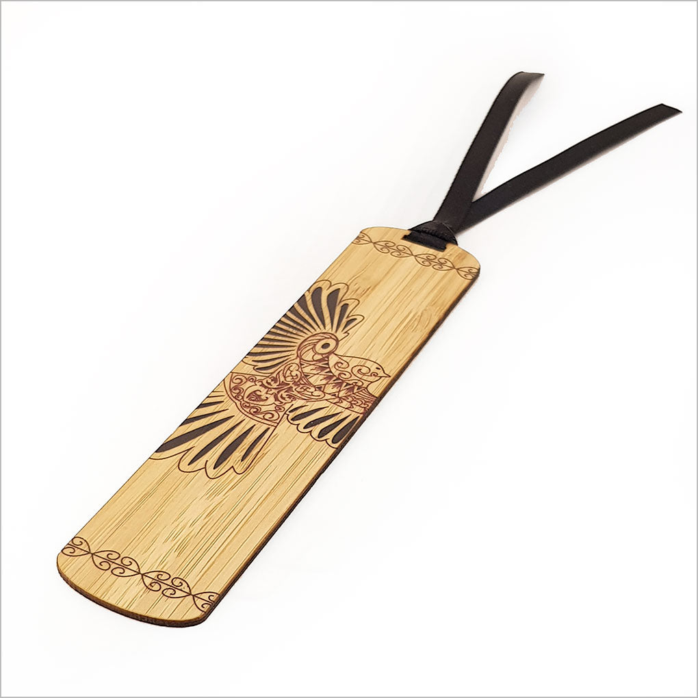 Greeting card featuring a kowhaiwhai fantail design with a bamboo bookmark, crafted on premium textured cardstock.