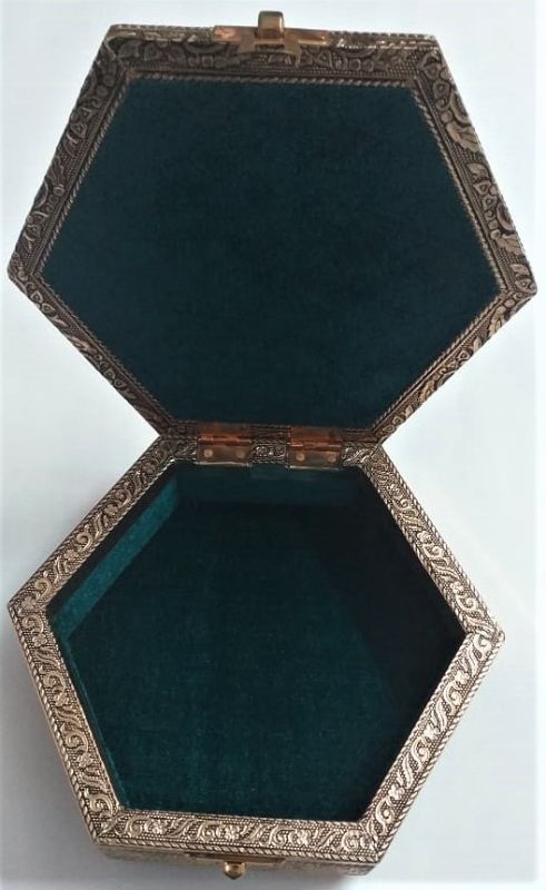 Hand-crafted hexagonal jewellery box with floral motifs, perfect for storing trinkets and enhancing home decor.