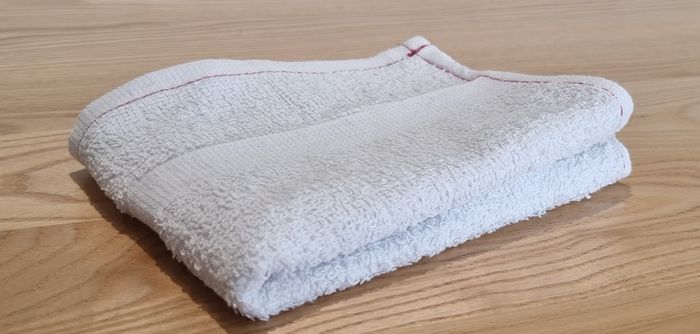 High-quality Commercial Terry Towel, 40cm x 60cm, 65% cotton, stylish red stitching, ideal for gyms, spas, and hotels.