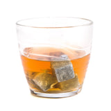 Whisky Stones set with 9 granite cubes for chilling drinks without dilution, comes with a black velvet pouch for storage.