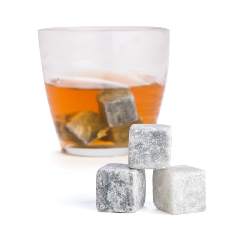 Premium whisky stones set includes 9 granite cubes for chilling drinks without dilution, perfect for connoisseurs.