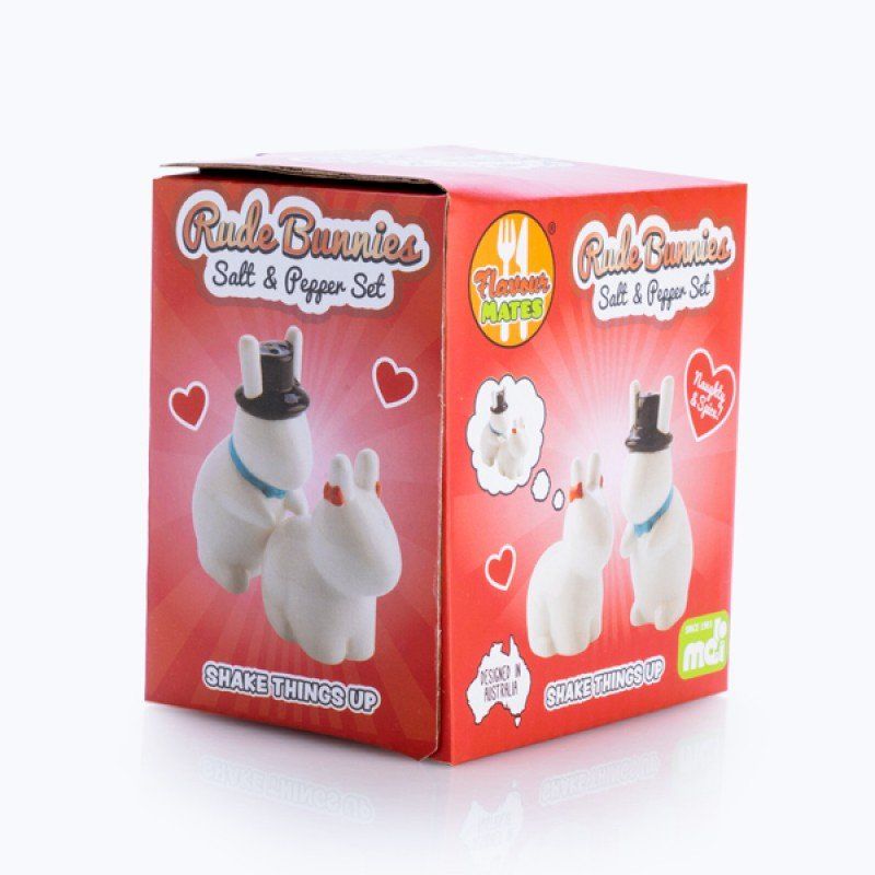 Playful ceramic salt and pepper shakers shaped like bunnies, one in a top hat, perfect for adding charm to your table.