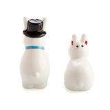 Cheeky ceramic salt and pepper shakers shaped like bunnies, features top hat and bowtie, perfect for fun dining decor.