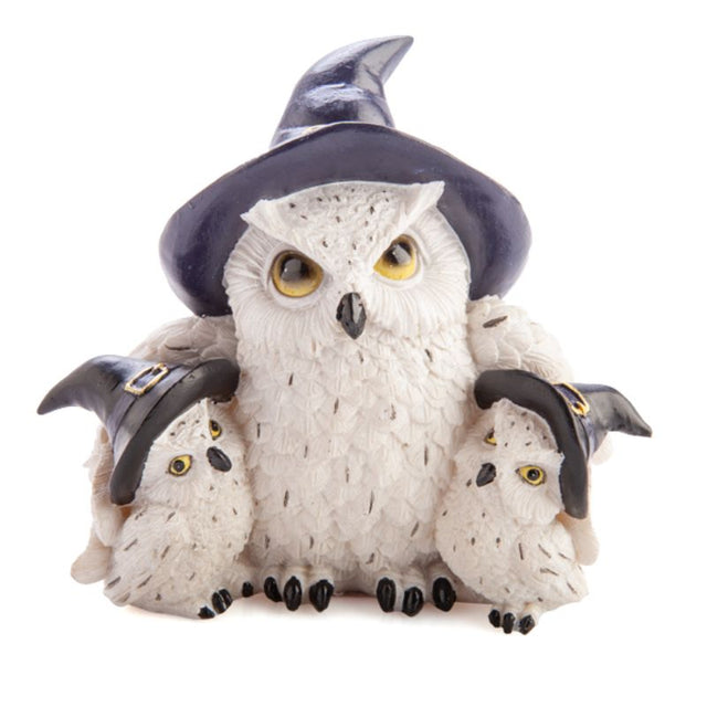 Charming Snowy Owl Family figurine with witch hats, crafted from polyresin, measuring 13.5 cm, perfect for home decor.