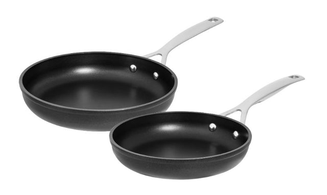 Non-stick 2-piece frypan set made from durable forged aluminum; perfect for even cooking and easy cleanup.