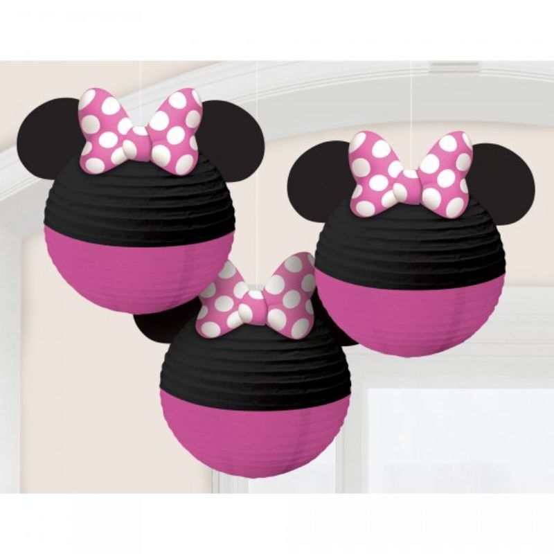 Three vibrant Minnie Mouse paper lanterns with bows and ears, perfect for adding Disney charm to any celebration.