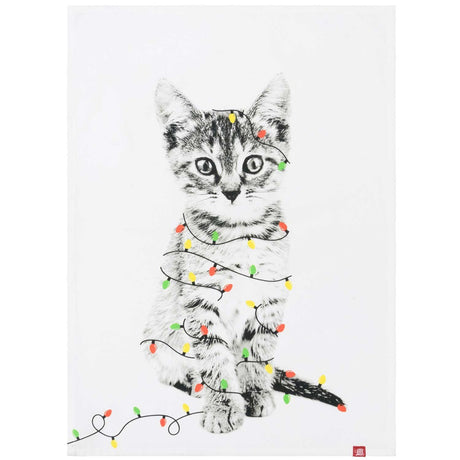 Cute kitten surrounded by colorful Christmas lights on a soft cotton tea towel, perfect for festive kitchens.