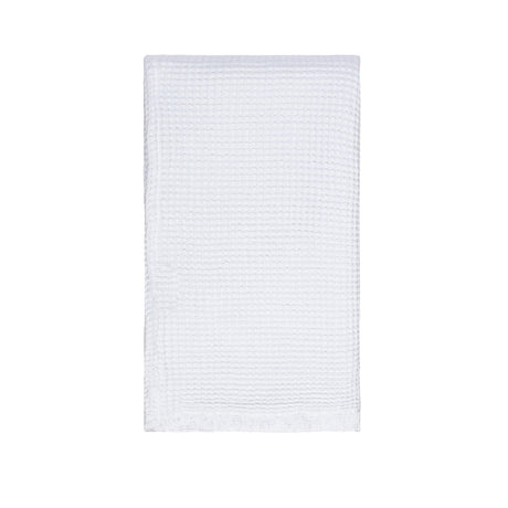 Stylish white waffle throw blanket in soft cotton, perfect for cozying up on chilly evenings and enhancing home decor.