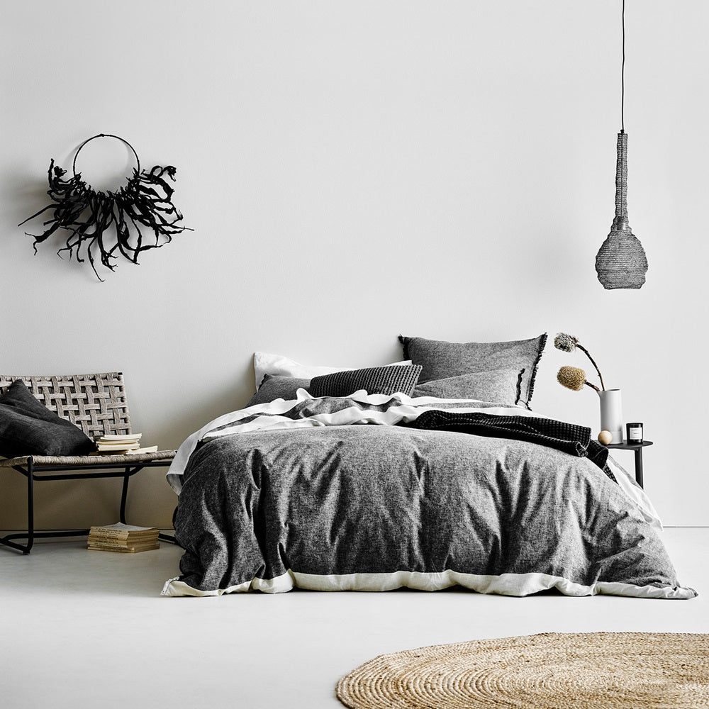 Queen size duvet cover in black with chambray fringe border, crafted from linen and cotton for a vintage wash look.