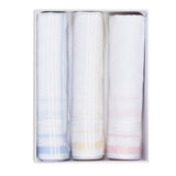 Elegant set of three 100% cotton ladies handkerchiefs with pastel borders, presented in a stylish gift box.