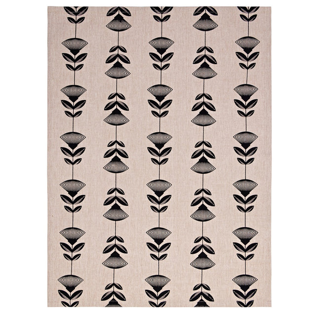 Black Pohutukawa tea towel featuring symmetrical floral designs, 100% cotton, 50 x 70cm with hanging loop for easy storage.