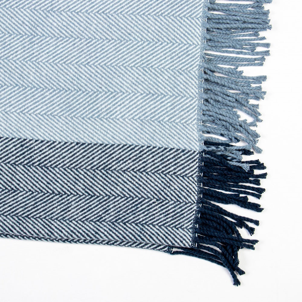 Tekapo BLUE Throw featuring a herringbone design and twisted tassels, perfect for warmth and style in your home.