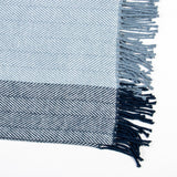 Tekapo BLUE Throw featuring a herringbone design and twisted tassels, perfect for warmth and style in your home.