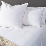 Queen duvet cover featuring an elegant blanket stitch edge, crafted from 85% cotton and 15% linen, measuring 210 x 210 cm.