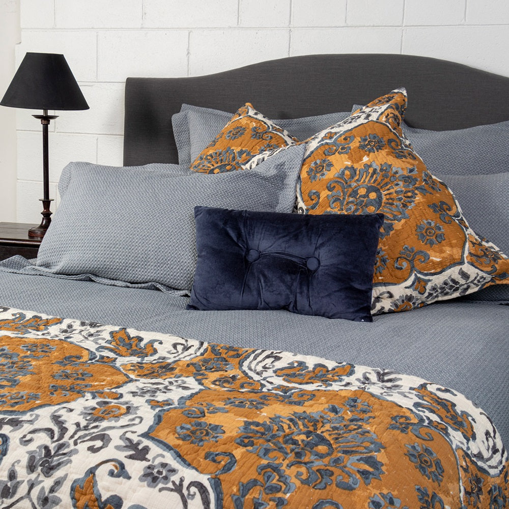 Elegant indigo king duvet cover with stitched zigzag pattern, crafted from premium cotton for comfort and durability.