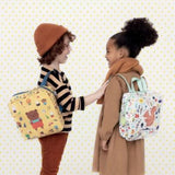 Colorful Djeco Squirrel Backpack featuring vibrant squirrel designs, adjustable straps, and spacious interior for kids' adventures.