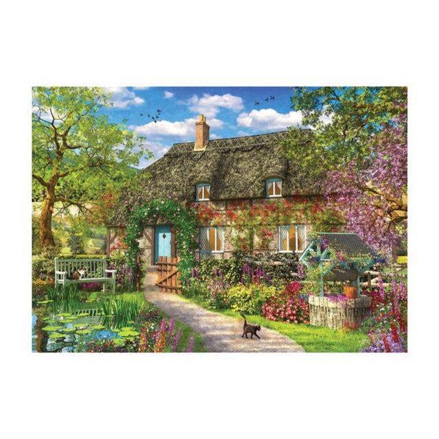 1000-piece puzzle featuring a vibrant Spring Cottage scene surrounded by colorful flowers and lush greenery.