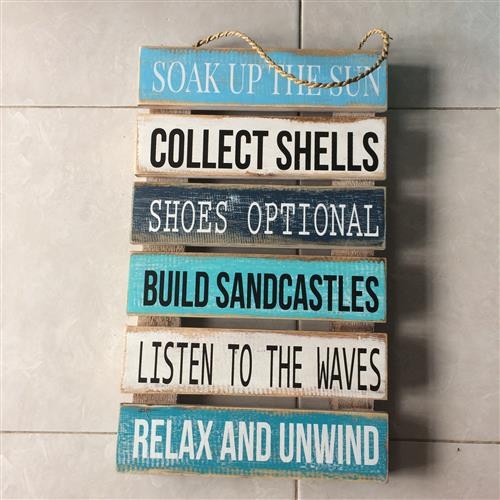 Colorful "Soak up the Sun" wall sign, 30cm x 50cm, crafted to inspire positivity and embrace summer vibes in any space.