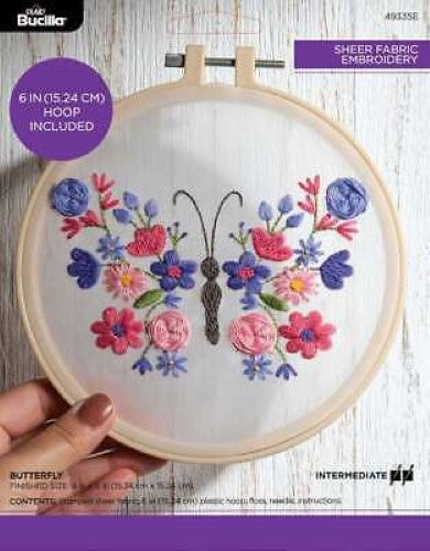 Bucilla Stamped Embroidery kit featuring a 6-inch sheer butterfly design in vibrant pink and purple hues for creative stitching.