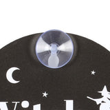 Whimsical 'Witch at the Wheel' window sign with crescent moon and stars, perfect for adding magic to decor or car.