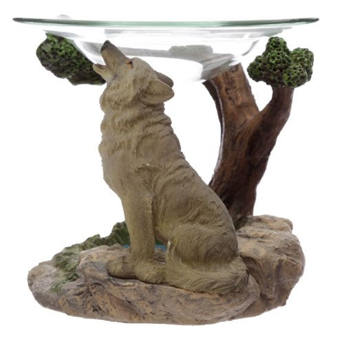 Intricately designed wolf oil burner made of resin with a removable glass dish for essential oils, promoting relaxation and serenity.