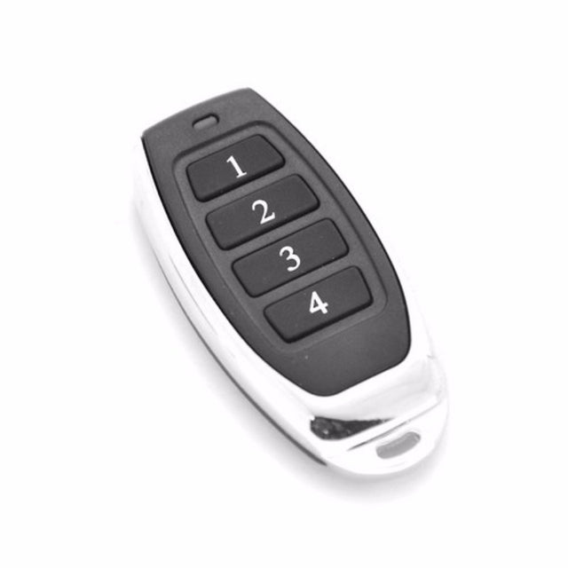 Compact ATA PTX5 Trio Code garage remote with four buttons for secure and convenient access, designed for Version 1 devices.