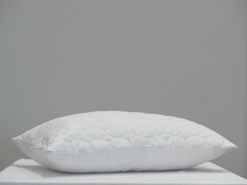 Quilted microfiber pillow protector for King Lodge pillows, eco-friendly, soft, with a durable zipper and stylish design.