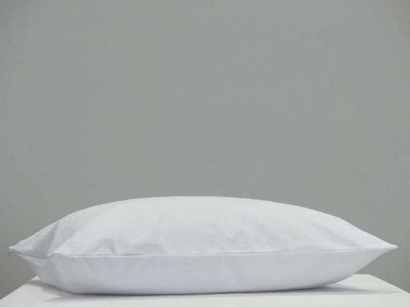 Dreamticket Waterproof Pillow Protector (73cm) in white, featuring 100% waterproof, breathable polyurethane for ultimate pillow protection.