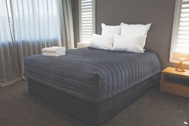 Midnight cover sheet for queen beds, lightweight, stylish double-sided design for a modern bedding upgrade.