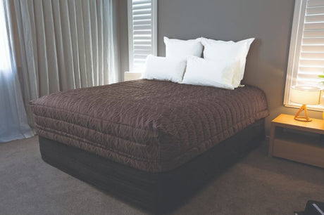 Elegant Tussock cover sheet for queen bed, featuring double-sided pattern, lightweight fabric, and easy care design.