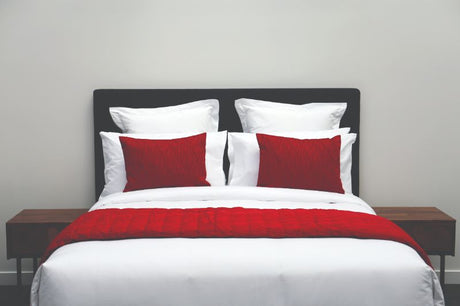 Ruby bed scarf elevating bedroom style, versatile as a coverlet or runner, crafted from luxurious polyester for warmth.