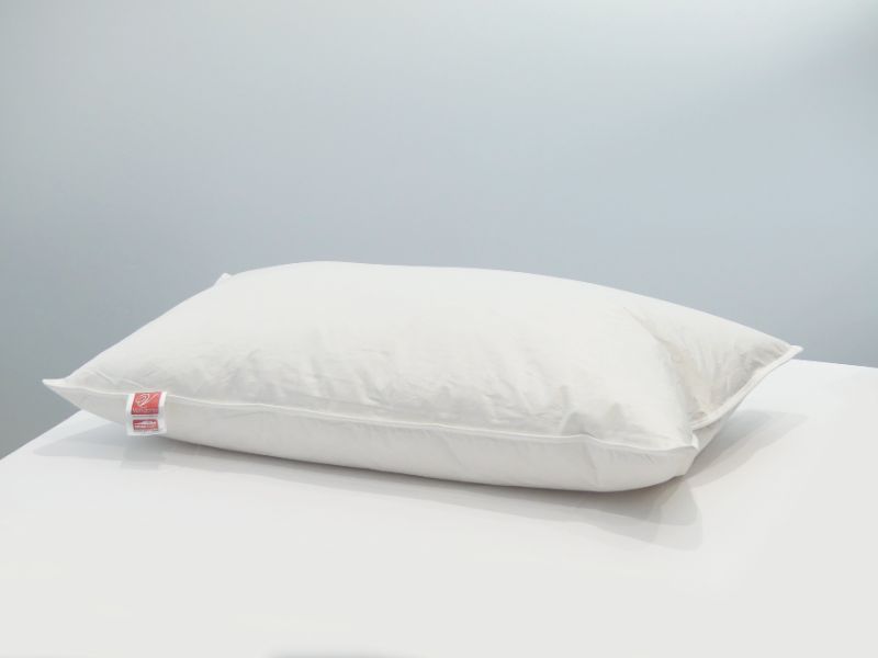 Luxurious Super King Feather & Down Pillow with 25% duck down and 75% feathers for ultimate comfort and support.