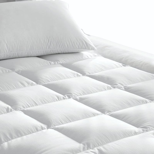 Luxury white Comfort Topper for Super King beds, made from recycled microfibre, offering 600gsm softness and support.