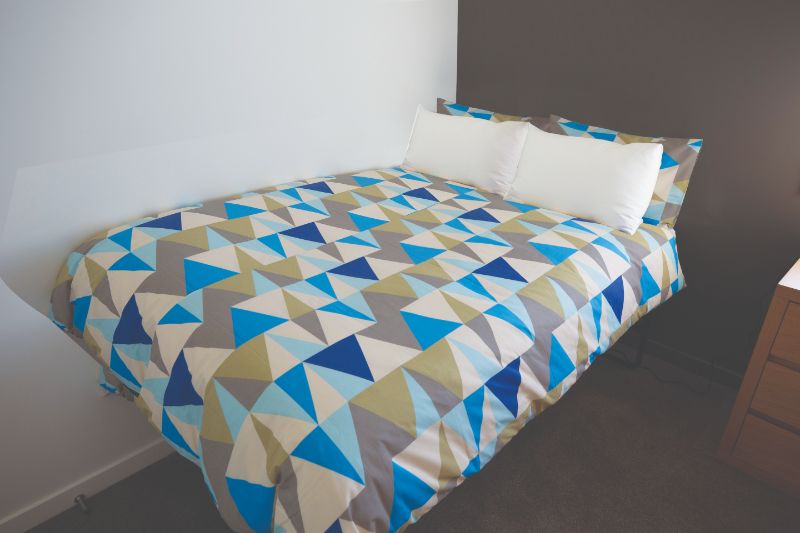 King Single Duvet Cover - Jax Multi features a vibrant geometric pattern, 50/50 poly-cotton, and easy-care design for stylish comfort.