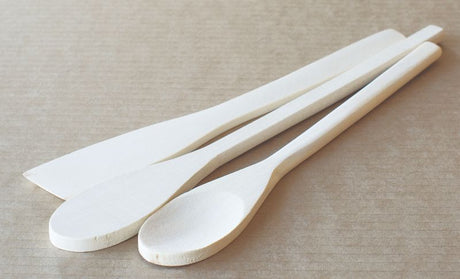 Set of 3 eco-friendly wooden cooking spoons for durable, gentle stirring and serving, ideal for all kitchen tasks.