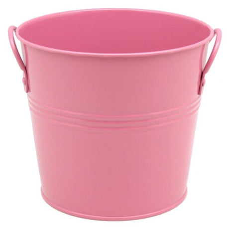 Dusky pink metal bucket with two handles, 15cm diameter, ideal for decor, storage, or as a planter.