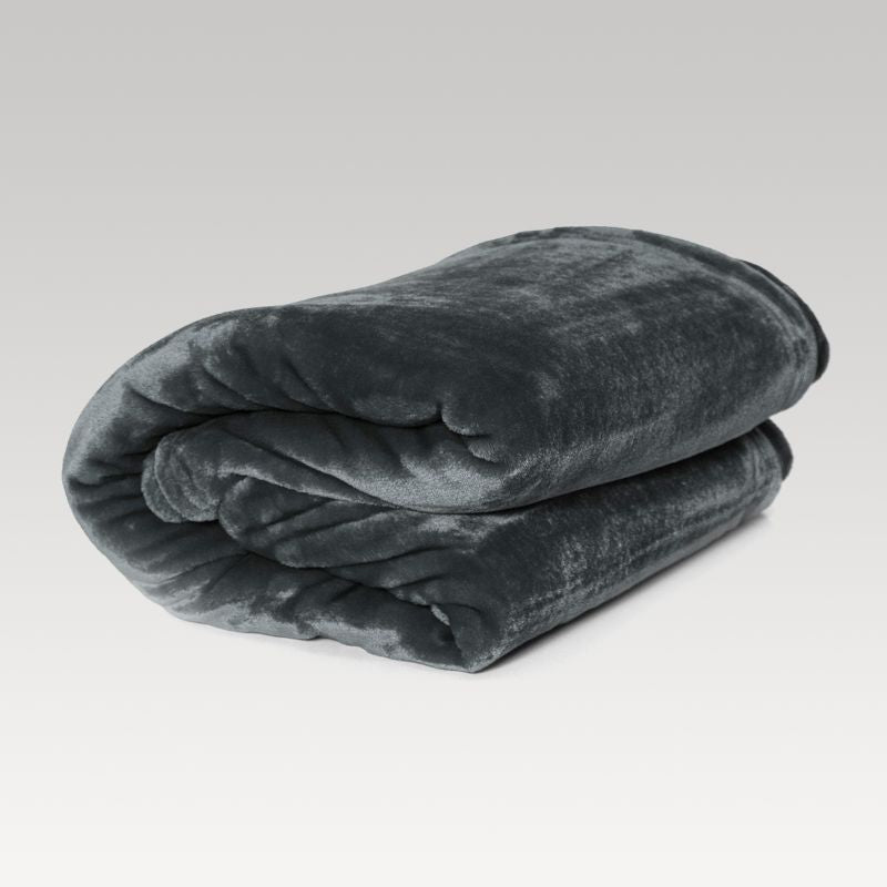 Soft charcoal coral fleece blanket, perfect for cozying up on chilly nights or adding elegance to any room.