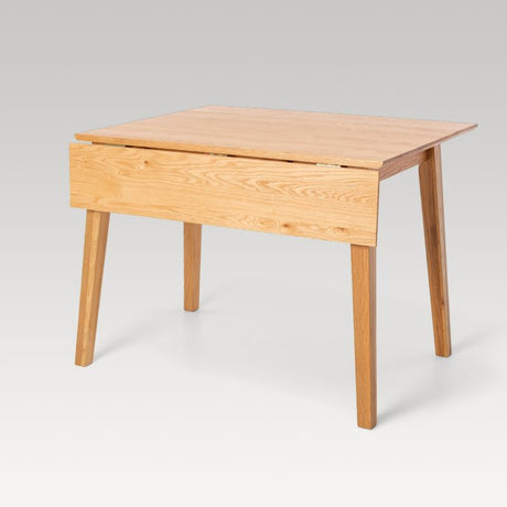 Elegant Scandinavian drop leaf table in solid white American Oak, perfect for small spaces and versatile gatherings.