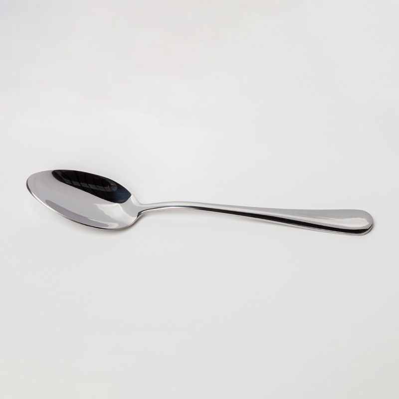 Cutler Soup Spoon in high-polish stainless steel, featuring smooth edges for elegant dining and versatile use.